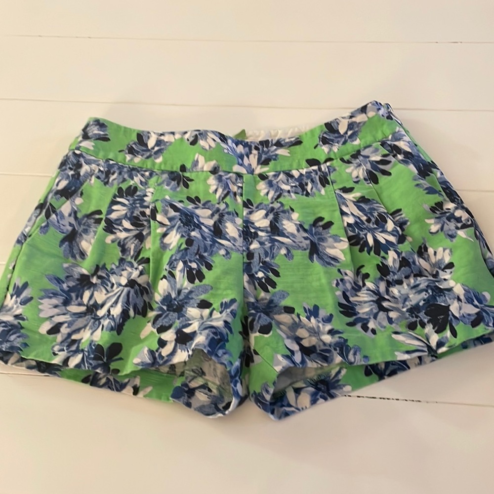 J. Crew green linen pleated shorts. Pockets included.